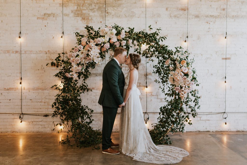 Wedding Couple photos at Brake and Clutch Warehouse in Dallas Texas after ceremony 