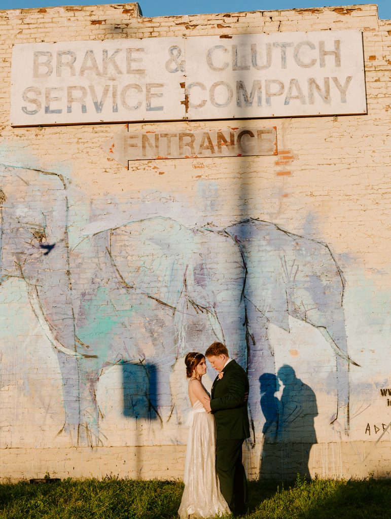 Wedding Couple photos at Brake and Clutch Warehouse in Dallas Texas after ceremony 