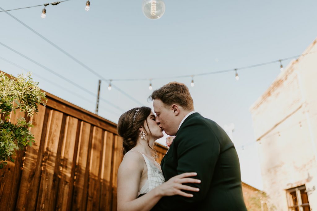 Wedding Couple photos at Brake and Clutch Warehouse in Dallas Texas after ceremony 