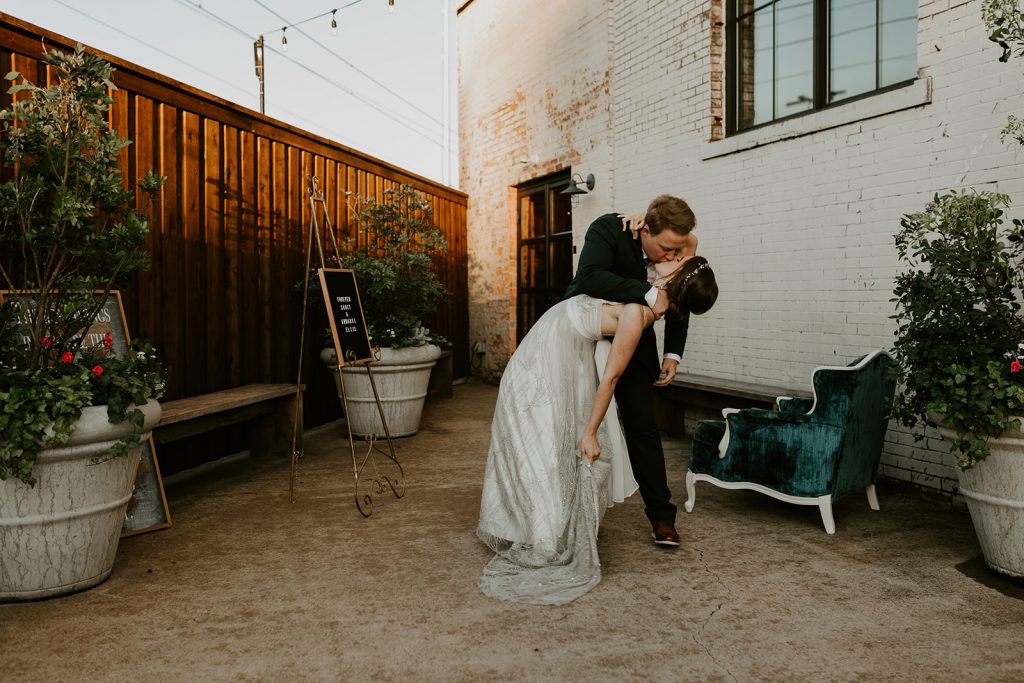 Wedding Couple photos at Brake and Clutch Warehouse in Dallas Texas after ceremony 