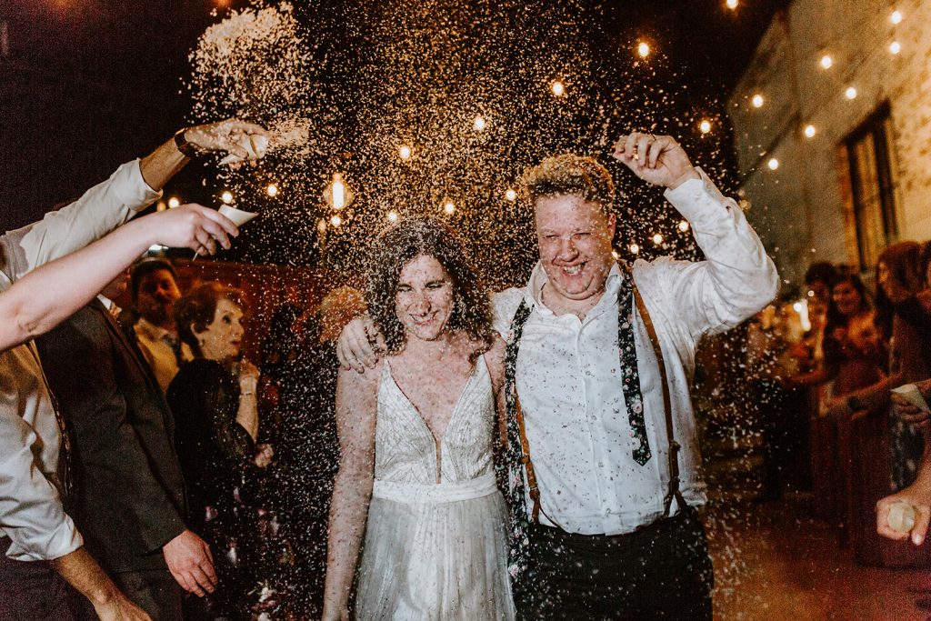 Confetti Exit after Wedding Reception at Brake and Clutch Warehouse in Dallas Texas