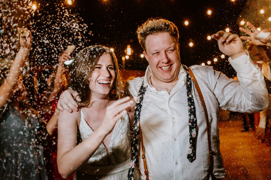 Confetti Exit after Wedding Reception at Brake and Clutch Warehouse in Dallas Texas