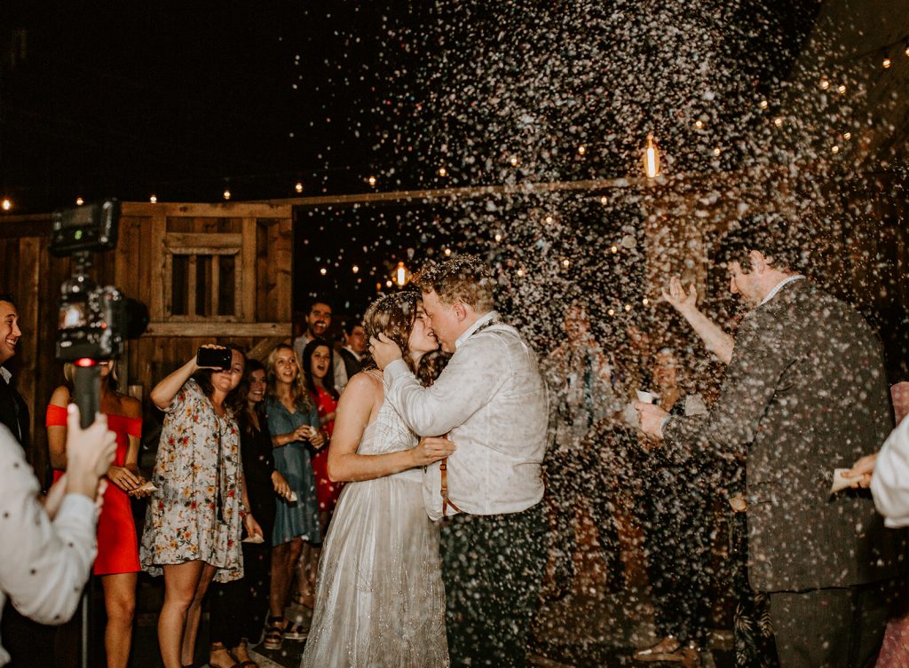 Confetti Exit after Wedding Reception at Brake and Clutch Warehouse in Dallas Texastch Warehouse in Dallas Texas