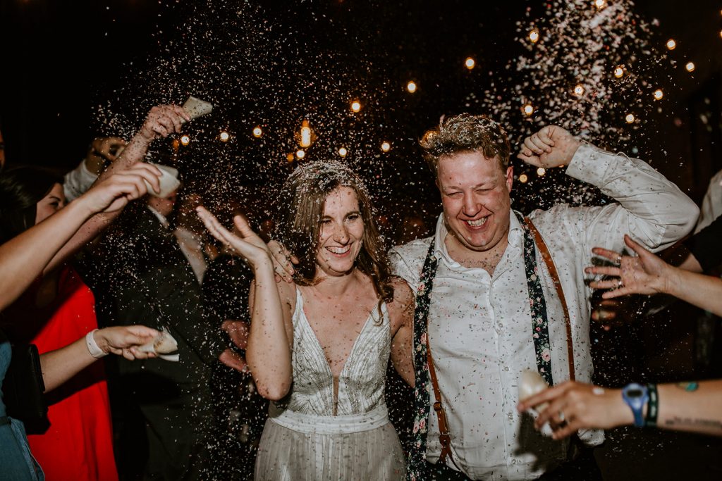 Confetti Exit after Wedding Reception at Brake and Clutch Warehouse in Dallas Texas